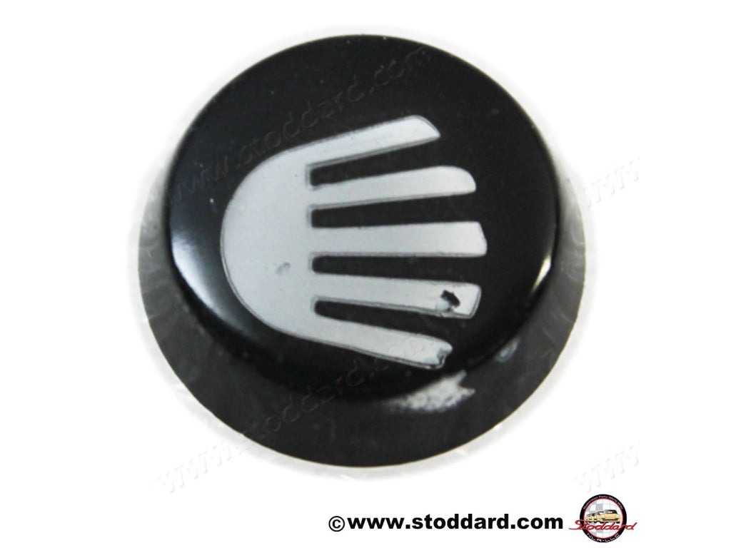 Cap With Symbol For Headlight Illumination
