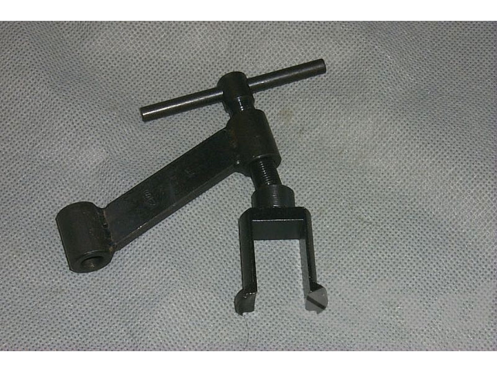 Valve spring compressors exhaust