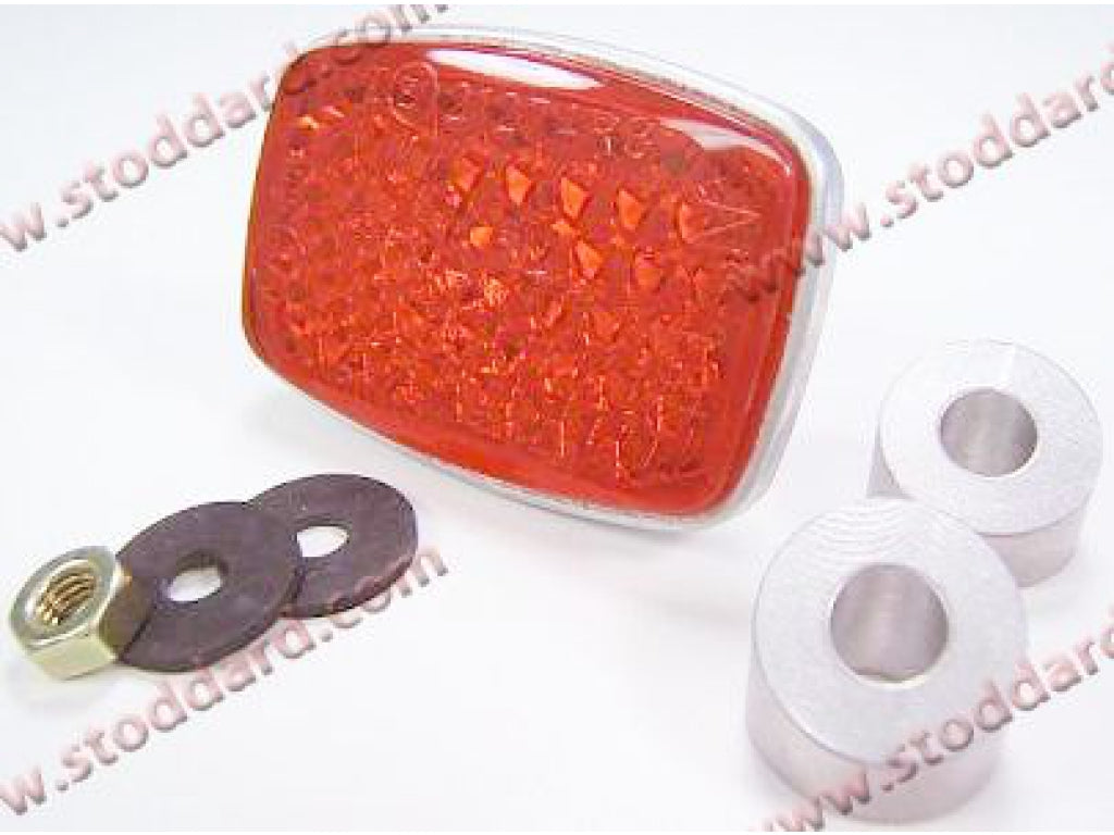 Rear Reflector, Plastic Lens With 6mm Stud, Aluminum Base and Washers. For 356B 356C and European spec cars with reflectors below bumper