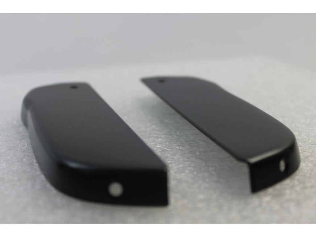 Black end cap for left front and right rear rocker trim, set, for cars with standard fender. 2 req'd. Fits 1974-1977.