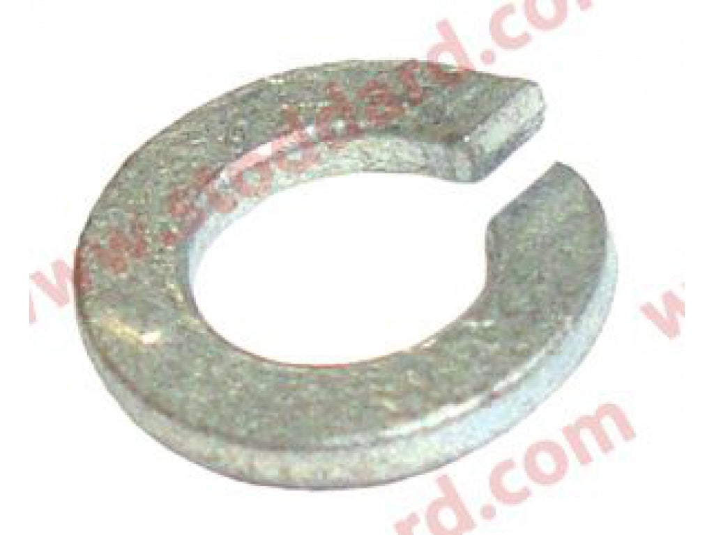 Washer 3mm attaches brake adjuster retaining spring to wheel cylinder